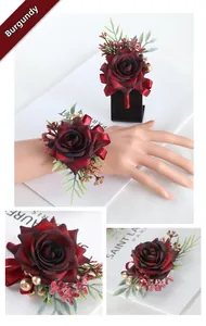 Detail of wine red silk rose corsage and wristlet set with gold berries and ribbons