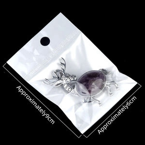 Silver elk brooch pendant with oval purple crystal inlay and 9x6cm packaging size