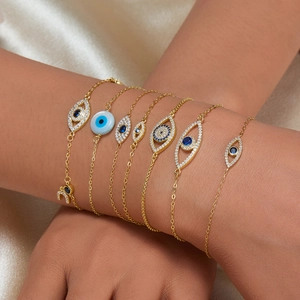 925 sterling silver evil eye bracelet with blue zircon stones on a gold chain