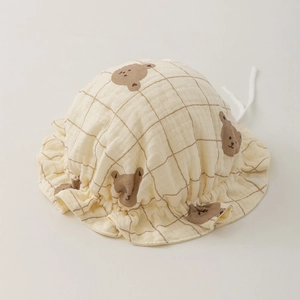 Detail of baby sun hat with ruffle brim, bear prints and breathable cotton gauze fabric