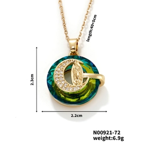 Macro view of gold pendant featuring Virgin Mary icon and dimensions for reference
