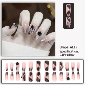Faux ongles élégants D448 avec motifs floraux noirs, nœuds 3D et détails de perles