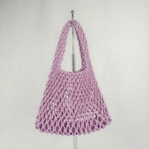 Detail showing the intricate purple cotton rope weave and mesh texture of this tote bag
