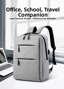 Detailed view of grey laptop backpack with built-in USB port and large capacity storage