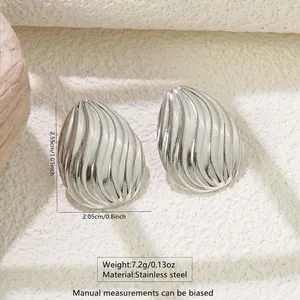 Detail shot of stainless steel teardrop earrings showing weight 7.2g and size 2.55cm