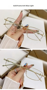 Detailed close-up of golden metal frame glasses with unique geometric node temple design