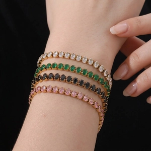 Ensemble de bracelets tennis avec zircons multicolores coupe ovale sur monture dorée