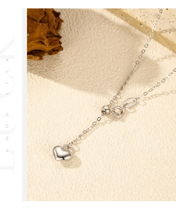 Close-up of S925 sterling silver Y-shaped necklace with heart pendant and lobster clasp