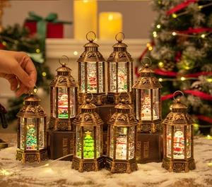 Detail of vintage bronze Christmas lanterns with snow globe effect and holiday scenes