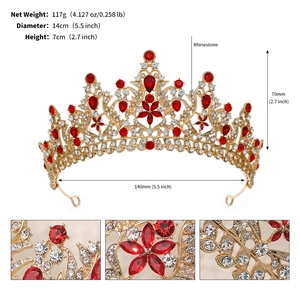 Detail view of gold alloy crown with red rhinestones and technical size specifications