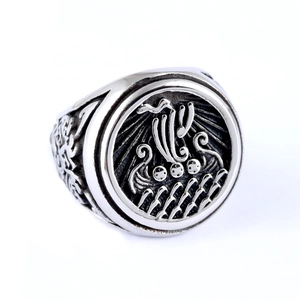 Silver Viking seal ring featuring an embossed longship design on a polished band