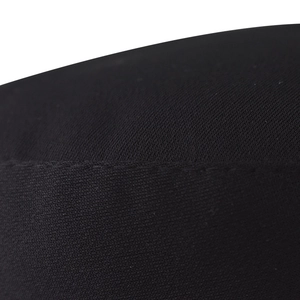Detailed macro view of black knitted fabric texture and flat stitching on the PU military cap