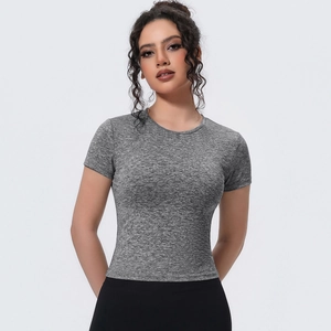 Detailed close-up of slim fit yoga T-shirt in heather grey with moisture-wicking fabric