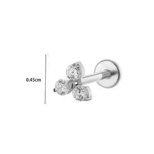 Detail view of 0.45cm titanium stud earring with three round zircons and flat back disc