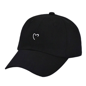 Classic black twill cotton baseball cap featuring minimalist white embroidered heart design