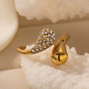Gold stainless steel open ring featuring a teardrop design with sparkling crystal accents