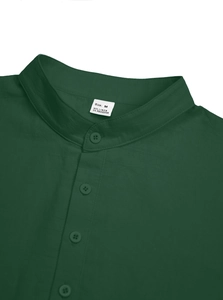 Detailed macro view of the mandarin collar and fabric texture of the green linen shirt