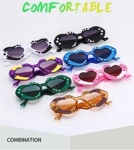 Collection of seven heart-shaped diamond sunglasses in various vibrant colors