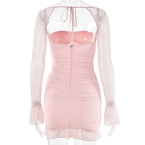 Detailed back view of pink mesh sleeve mini dress with ruching and ruffle hem detail