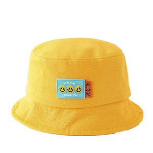 Cappello a secchiello giallo per bambini in cotone con toppa smiley e ricamo