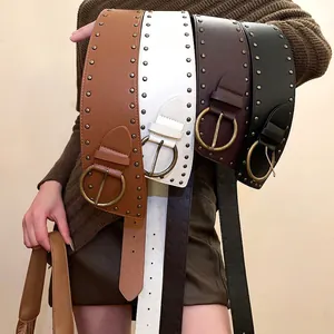 Vintage studded wide leather belts with round metal buckles in four classic colors