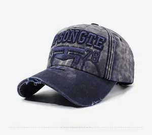 Close-up of vintage washed baseball cap featuring 3D embroidery and distressed brim details