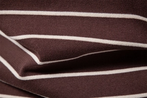 Detailed close-up of dark brown and white striped knit fabric texture for men's sweater
