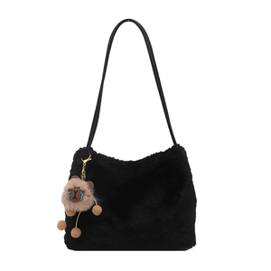 Minimalist black plush shoulder bag with a cute brown stuffed animal charm accessory