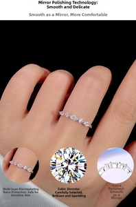 Macro view of S925 sterling silver ring featuring marquise and round cubic zirconia stones
