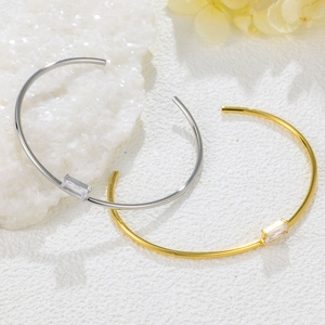Minimalist gold and silver titanium steel bangles with rectangular cubic zirconia