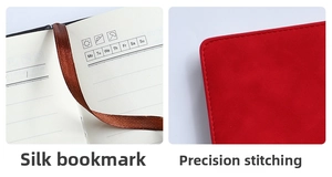 Detail of red PU leather notebook with brown ribbon bookmark and lined inner pages