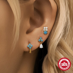 S925 sterling silver earring set with turquoise and zircons shown on a model