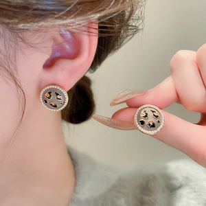 Vintage gold-plated round stud earrings with leopard print enamel and pearl halo trim