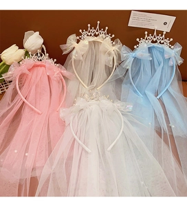 Detail showing assorted princess crown headbands with soft tulle veils and pearl accents