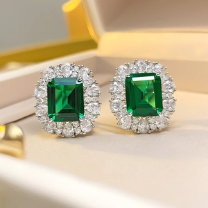 French palace style emerald cut green gemstone stud earrings with silver pavé frame