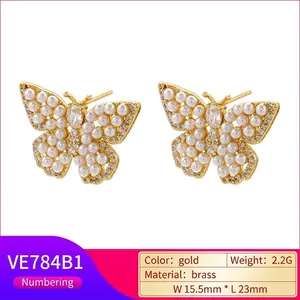 Elegant 18K gold plated brass butterfly earrings with inlaid pearls and sparkling crystals