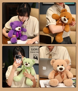 Close-up of four plush teddy bears in purple and brown with silk ribbon bows