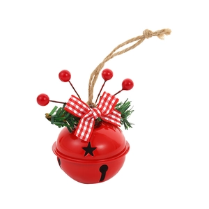 Christmas red metal bell with buffalo plaid bow, pine needles and berries decor