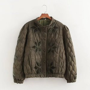 Women's olive green quilted jacket with floral appliques and diamond stitching pattern