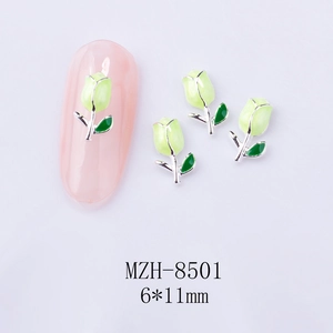 Detail of 6x11mm green tulip nail art charms with silver alloy outline on gray background