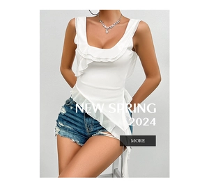 Detail of white sleeveless U-neck top with asymmetrical ruffled layers and chic Y2K aesthetic