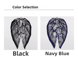 Detail view of paisley print scarves in black and navy blue with high-gloss silk finish