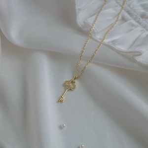 Luxurious S925 sterling silver gold plated key necklace with sparkling pavé crystals