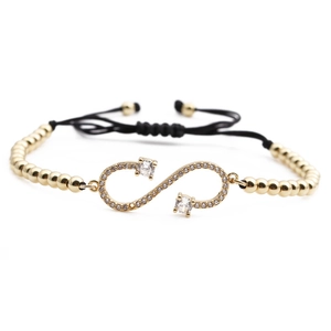 Adjustable infinity symbol bracelet with sparkling zircon stones and black woven cord