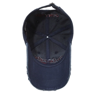 Vintage navy blue washed cotton baseball cap with internal red embroidery detail