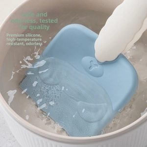 Close-up of heat-resistant light blue silicone storage bag being sterilized in boiling water
