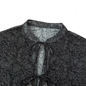 Dark grey fashion shirt with metallic print and a round neckline with lace-up detail