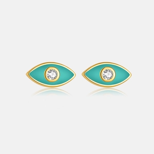 Detailed macro view of S925 sterling silver evil eye stud earrings with green enamel inlay