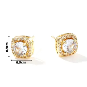 Detail view of 0.9cm square zircon stud earrings with gold plating and paved accents
