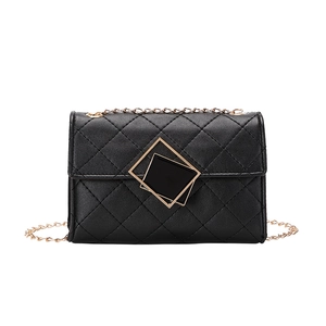 Elegant black quilted chain bag with geometric metal buckle on white background